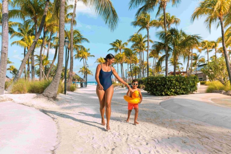 Mom & Son Walking on the Beach